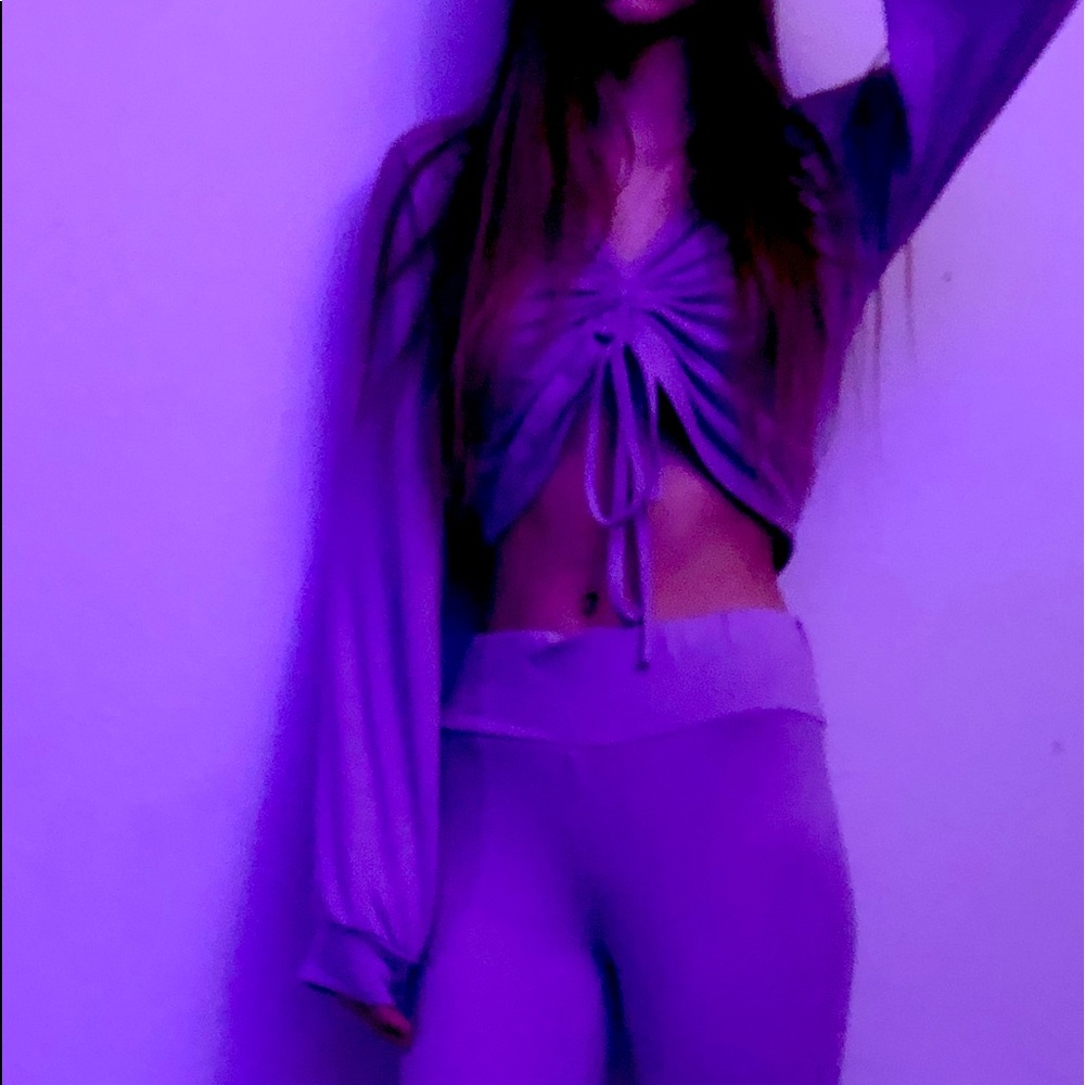 Flared Long sleeves, flared bottoms of pants, and worn once in good condition